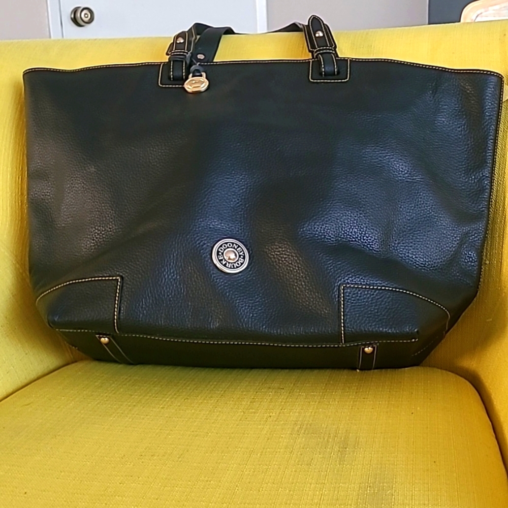 DOONEY AND  BOURKE OVERNIGHT BAG